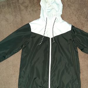 Zine zip up windbreaker, never worn, has small tear in sleeve, size XS blk/white